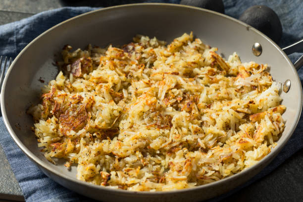 istock Homemade Fried Shredded Hashbrowns and Eggs 1270121082