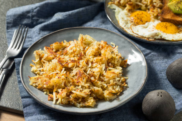 istock Homemade Fried Shredded Hashbrowns and Eggs 1270121153