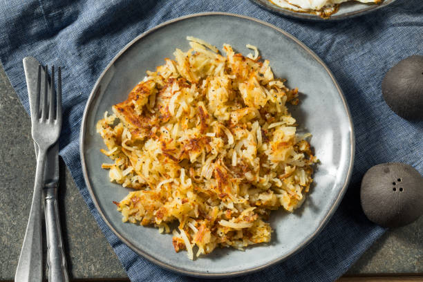 istock Homemade Fried Shredded Hashbrowns and Eggs 1270122141
