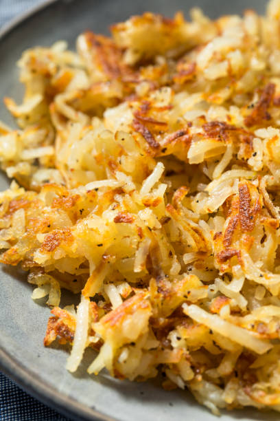 istock Homemade Fried Shredded Hashbrowns and Eggs 1270122295