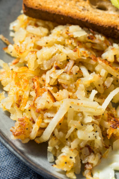 istock Homemade Fried Shredded Hashbrowns and Eggs 1270122325