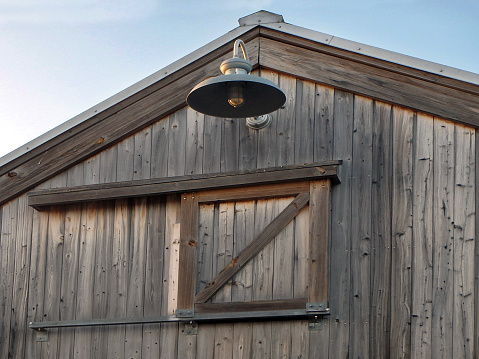 OLYMPUS DIGITAL CAMERA    Barn door with aged patina on wood.l