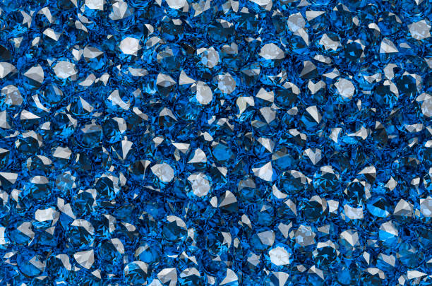 Background from blue diamonds or sapphires with brilliant cut. 3D rendering Background from blue diamonds or sapphires with brilliant cut. 3D rendering blue saphire stock pictures, royalty-free photos & images
