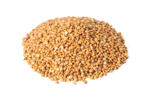 istock Buckwheat seeds closeup isolated on white background. Front views, close-up 1270128992