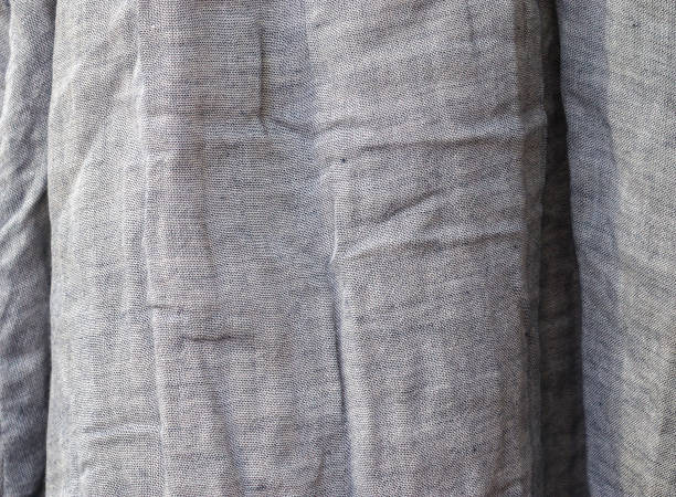 istock Detailed close up view on samples of cloth and fabrics in different colors found at a fabrics market 1270129233