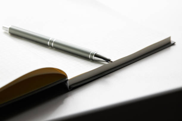 istock open blank diary or notebook with pan. storytelling concept. planning concept. minimal 1270134635