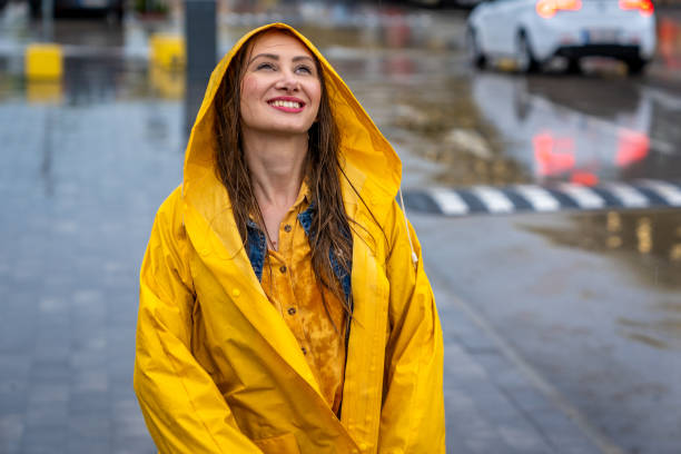 istock Young woman walking on the rain 1270134716