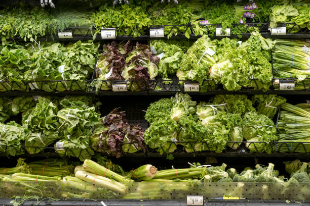 istock Fresh vegetables on shelf display in a supermarket 1270135348