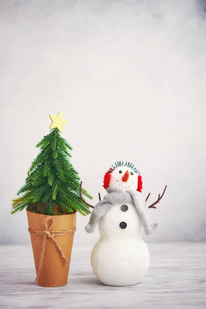 istock Cute Christmas still life image with snowmen and Christmas Tree 1270143108