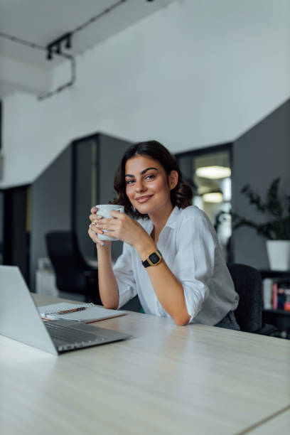 istock One brunette girl, casually dressed, smiling at camera. 1270150563