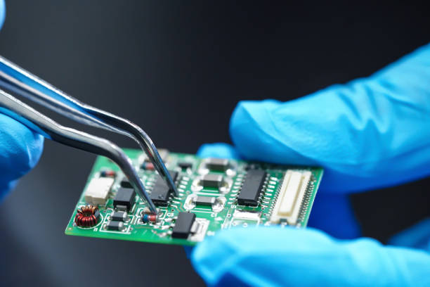 istock technician repairing inside of hard disk. Integrated Circuit. the concept of data, hardware, technician and technology. 1270154825