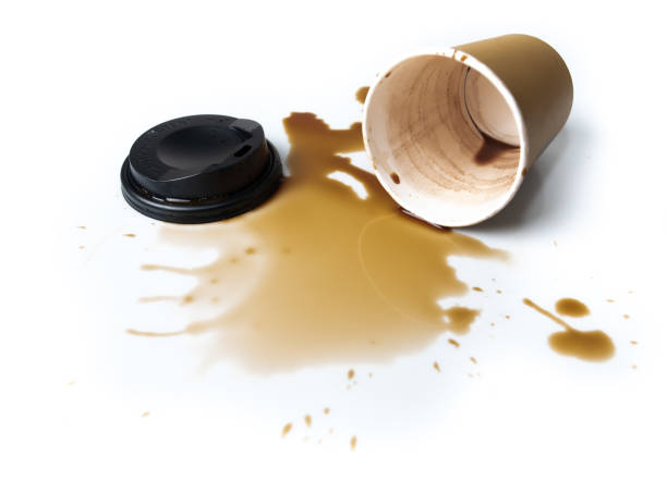 istock Hot coffee spill stain accident drop white background 1270157973