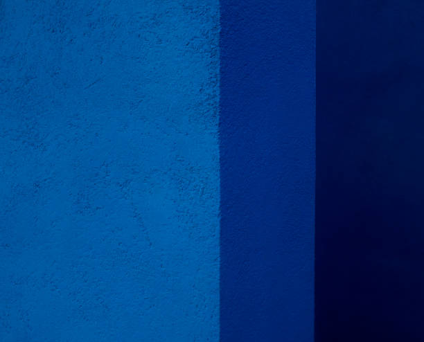 istock Blue color concrete wall background and texture 1270158030