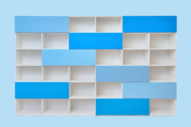 istock Modern white bookcase with blue doors isolated against blue background 1270166261