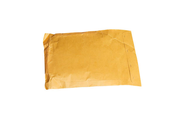 istock Closed brown envelope  online delivery isolated on white background 1270172294