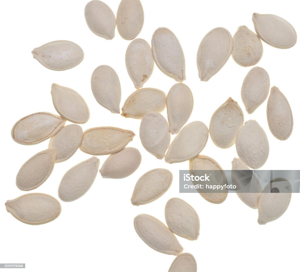 Pumpkin seeds Pumpkin seeds isolated on white background Agriculture Stock Photo