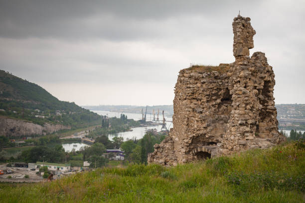 Ruined ancient fortress Calamita at cloudy day Ruined ancient fortress Calamita at cloudy day. Inkerman, Sevastopol, Crimea inkerman stock pictures, royalty-free photos & images