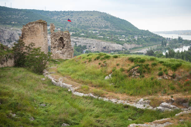 Landscape with ruined ancient fortress Calamita Landscape with ruined ancient fortress Calamita in Inkerman, Sevastopol, Crimea inkerman stock pictures, royalty-free photos & images