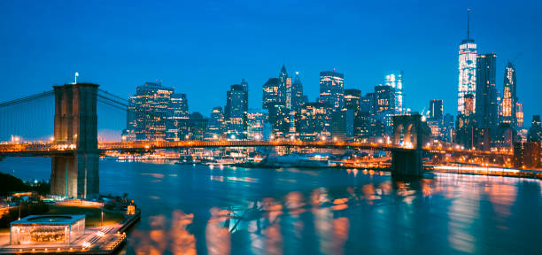 istock New York City at dusk with Brooklyn Bridge. 1270178080