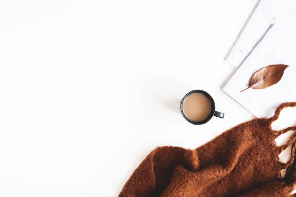 istock Autumn composition. Cup of coffee, plaid on white background. Autumn, fall concept. Flat lay, top view 1270181160