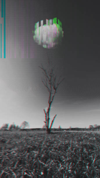 istock Dry tree without leaves in green meadow 1270183337