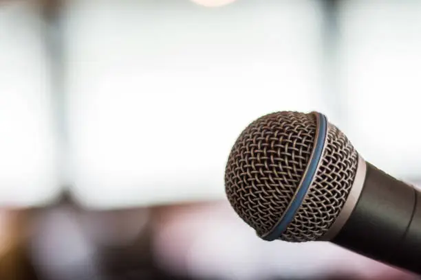 microphone at a concert detail view with bright background