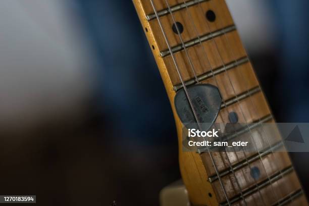 Guitar With A Pick Detailed View Stock Photo - Download Image Now - Color Image, Finger, Hand
