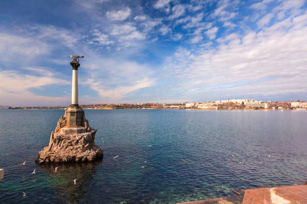 Monument to the scuttled ships on a Sunny day. Sevastopol, Crimea, Russia Monument to the scuttled ships on a Sunny day. Sevastopol, Crimea, Russia scuttle stock pictures, royalty-free photos & images