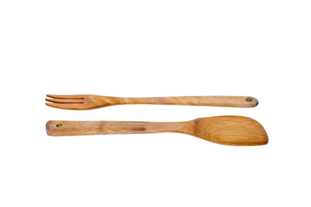 istock Wooden kitchen spatulas isolated on white background. Kitchenware 1270189130