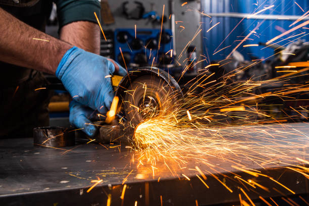 istock Welder working at the factory with metal 1270190482