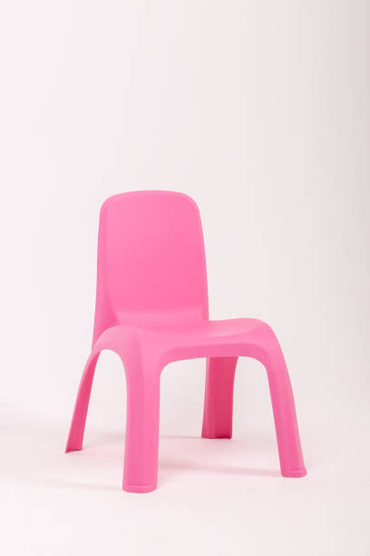 istock Children's plastic chair pink on a white background 1270193456