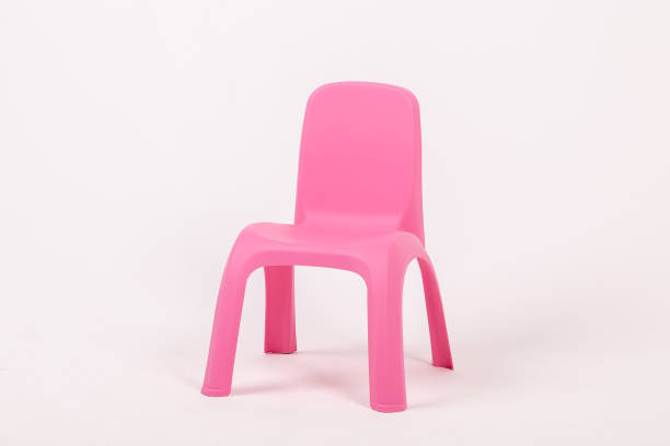 istock Children's plastic chair pink on a white background 1270193461