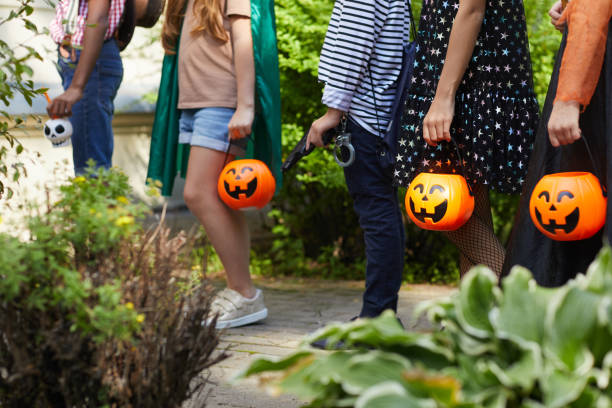 istock Children playing trick or treat 1270193522