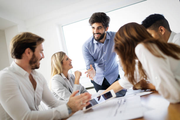 istock Business team people discussing documents and ideas at meeting 1270195747