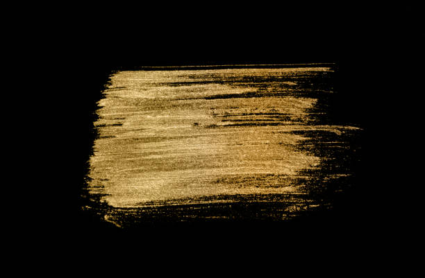 istock Abstract golden watercolor stain on black background 1270200025