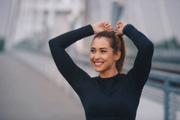 istock Fittnes woman tying her hair 1270200269
