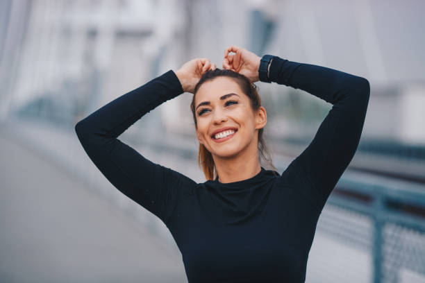 istock Fittnes woman tying her hair 1270200309