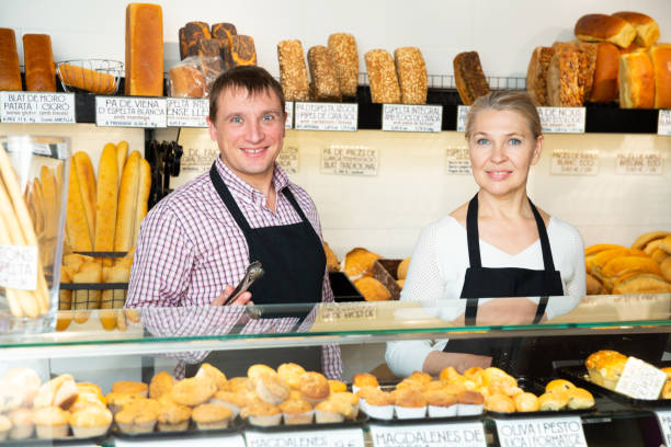 istock Bakers working in family bakery 1270210236