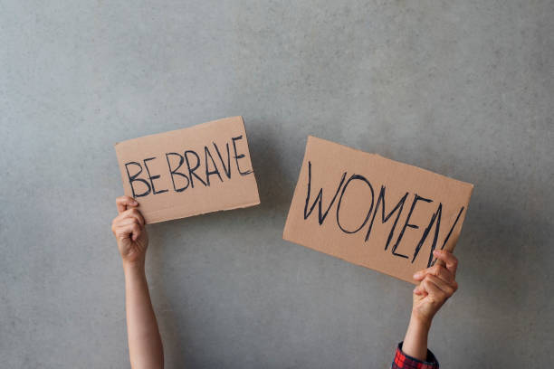 istock Woman activist hands with poster 1270211516