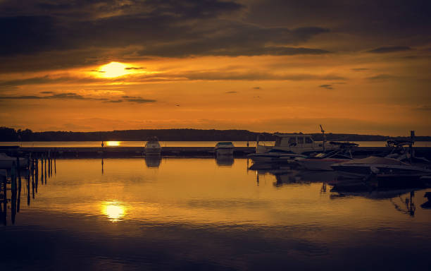 istock Yachts in the harbor at sunset 1270213353