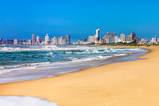 Durban cityscape from the north and the beach, a tourist attraction with apartments along the coast.