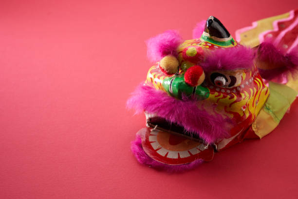 istock Chinese traditional dancing lion isolated on red background 1270214400