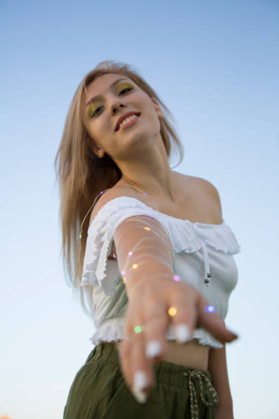 istock Collage with female portrait with lights 1270215760