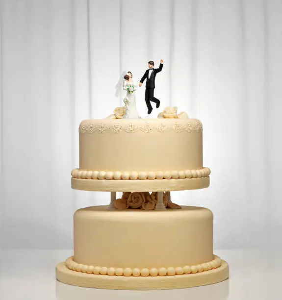 Wedding cake with bride and groom figurines