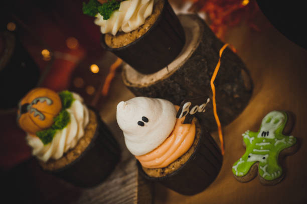 istock Halloween design homemade cupcakes on dark table 1270217267