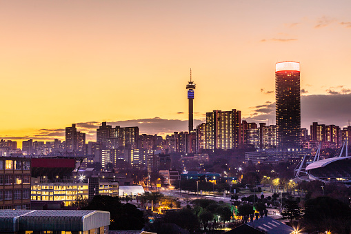 Johannesburg inner cityscape with the communication tower and ponte flats, at sunset dusk, Johannesburg is also known as Jozi, Jo'burg or eGoli, is the largest city in South Africa.