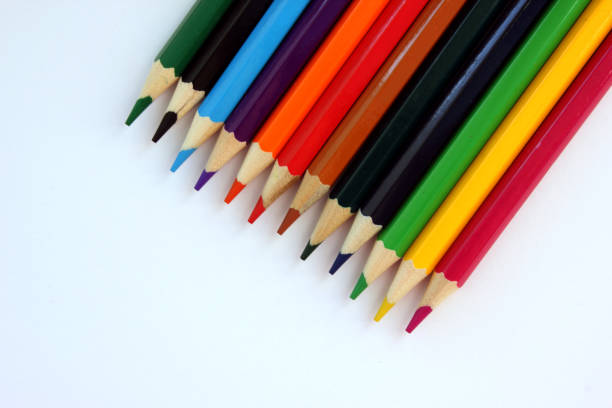 istock Colored pencils on white background. Many different colored pencils. Color pencil. Pencils are sharp. Pencils placed diagonally in the upper-right corner. Close-up. Copy space. Background. Flatlay 1270220545