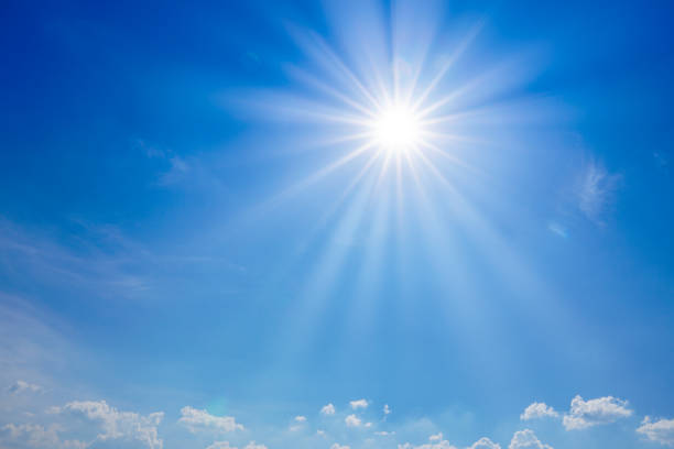istock blue sky with clouds and sun shines 1270221691