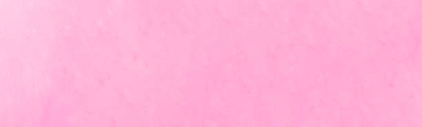 istock Pastel pink wooden textured web banner 1270222159