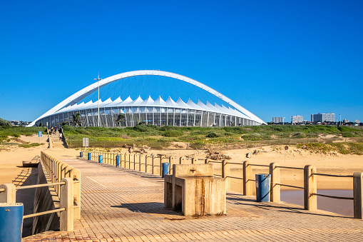 Moses Mabhida Stadium seen from the pier on the coast, this stadium was built towards the FIFA World Cup in 2010, with a capacity of 54000 people.